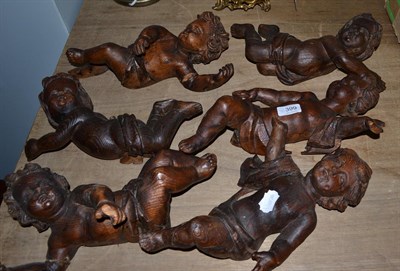 Lot 399 - Six 19th century Flemish carved wood putti