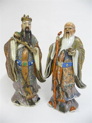 Lot 148 - A Pair of Cantonese Porcelain Figures of Sages, early 20th century, each with long beards and...