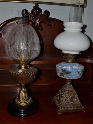 Lot 412 - Two Victorian oil lamps, one brass based and the other with an opaline shade (2)