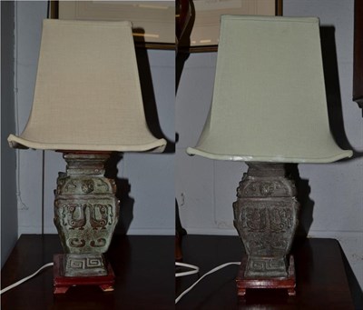 Lot 415 - A pair of table lamps with Chinese bronze bases of archaic form (2)