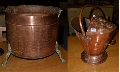 Lot 422 - A large copper and brass log bucket, of cylindrical form on claw feet; together with an...