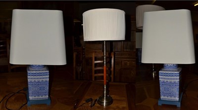 Lot 427 - A pair of modern Chinese style blue and white pottery table lamps, together with another modern...