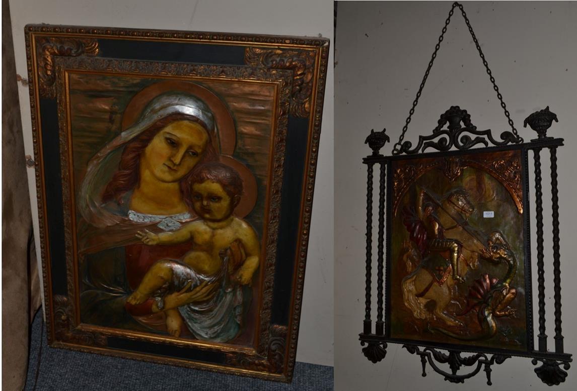 Lot 1011 - ~ Two relief polychrome plaques, one depicts the Virgin Mary and Child, the other St George and the