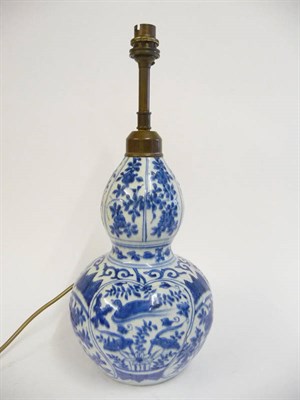 Lot 155 - A Chinese Porcelain Double Gourd Vase, perhaps early 17th century, moulded and painted in...