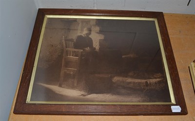 Lot 1073 - Alexander (Alex) Keighley (1861-1947) Two photographic prints, lady sat by fireside, signed,...