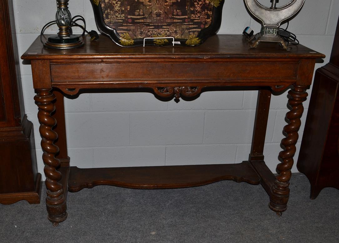 Lot 1092 - A 19th century oak buffet table, the moulded rectangular top above a frieze drawer over a pot board