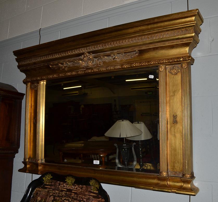 Lot 1093 - A reproduction gilt framed over mantel mirror, 136cm by 91cm