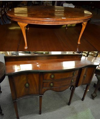 Lot 1098 - A reproduction oval inlaid quarter veneered walnut coffee table, 122cm by 86cm by 43cm,...