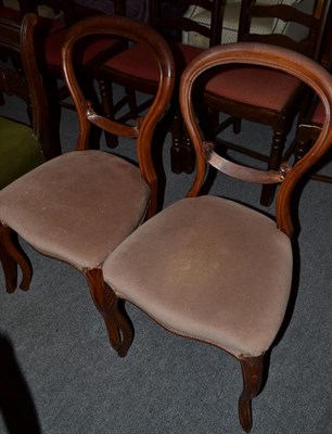 Lot 1107 - A pair of Regency carved mahogany dining chairs, a pair of Victorian balloon back chairs and a...