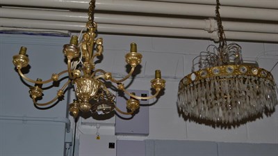 Lot 1115 - A silvered metal seven branch chandelier ornamented with bacchanalian figures (drop approx...