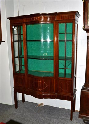 Lot 1127 - An Edwardian inlaid mahogany serpentine fronted display case, 123cm by 46cm by 176cm high