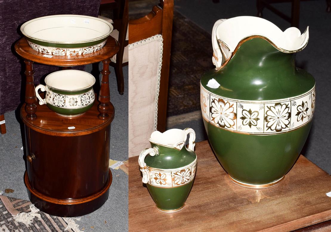 Lot 1134 - A 19th century mahogany circular washstand, 46cm diameter by 82cm together with wash jug, bowl,...