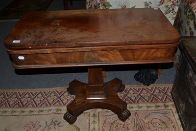 Lot 1136 - A Regency mahogany fold over tea table on waisted X-form base and scroll feet, 95cm by 47cm by 74cm