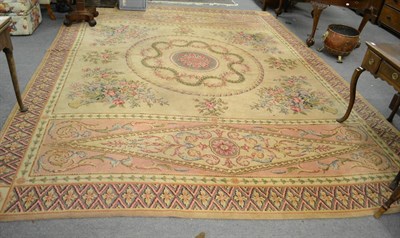 Lot 1139 - A small carpet, machine made of Savonnerie design, the soft corn field centred by a floral roundel