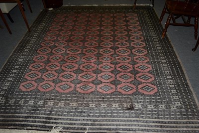 Lot 1140 - A Larhore ''Bukhara'' carpet, the field with columns of guls enclosed by multiple borders, 285cm by