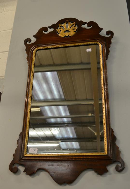 Lot 1145 - A parcel gilt mahogany fretwork mirror, 93cm by 52cm