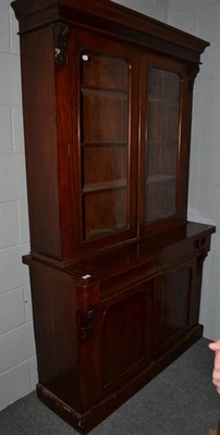 Lot 1151 - A Victorian mahogany glazed bookcase cabinet, 120cm by 46cm by 202cm high, together with a...