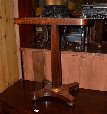 Lot 1154 - A 19th century rosewood occasional table the faceted standard on a waisted platform base, 64cm...
