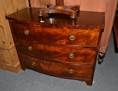 Lot 1155 - A 19th century mahogany bow front three-height chest of drawers 107cm by 54cm by 82cm high
