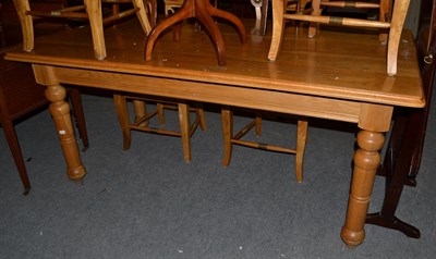Lot 1167 - A modern oak dining table together with a set of six dining chairs, table 180cm by 95cm by 80cm...