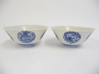 Lot 167 - A Pair of Chinese Porcelain Bowls, 19th century, with everted rims, painted in underglaze blue with