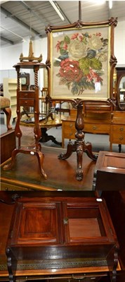 Lot 1176 - A Victorian carved mahogany pole screen, a mahogany hanging cupboard and a reproduction...
