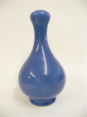 Lot 169 - A Chinese Mid Blue Ground Porcelain Bottle Vase, Qianlong reign mark but later, of pear form...