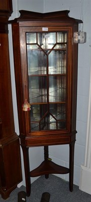 Lot 1184 - A reproduction inlaid glazed mahogany standing corner cupboard, 54cm by 32cm by 157cm high