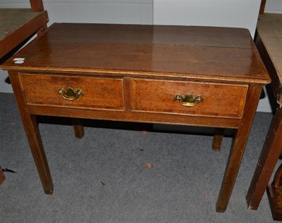 Lot 1188 - A George III oak and crossbanded two-drawer table, 91cm by 50cm by 70cm high
