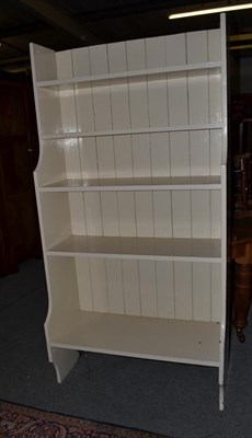 Lot 1193 - A white painted pine waterfall bookcase, 93cm by 40cm by 180cm