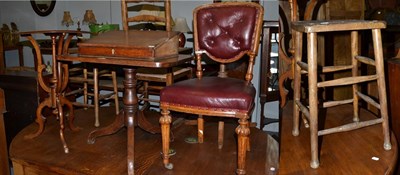 Lot 1194 - A walnut occasional table, 72cm high, a Georgian oak tripod table, 59cm high, a desk top...