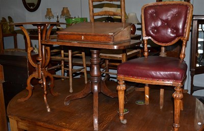 Lot 1194 - A walnut occasional table, 72cm high, a Georgian oak tripod table, 59cm high, a desk top...