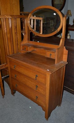 Lot 1195 - An early 20th century oak three piece bedroom suite; comprising a marble top washstand,...