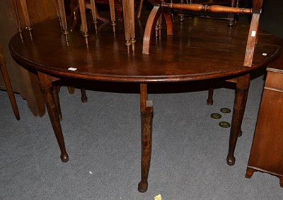 Lot 1198 - A 19th century oak gateleg table, 173cm by 143cm by 77cm high