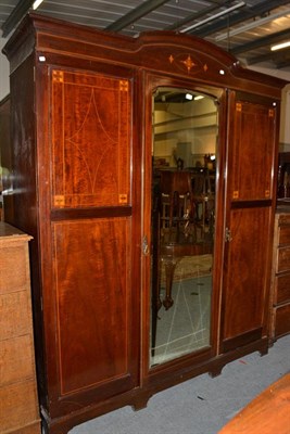Lot 1201 - An Edwardian inlaid mahogany triple wardrobe, 187cm by 59cm by 223cm high