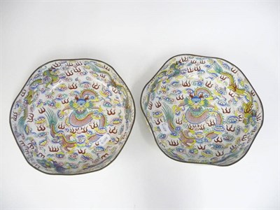 Lot 173 - A Pair of Chinese Canton Enamel Hexagonal Dragon Bowls, 19th century, internally painted with a...