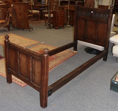 Lot 1221 - An 18th century style carved oak single bedstead, 93cm wide by 120cm high