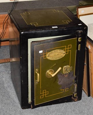 Lot 1222 - A Victorian Withy Grove Stores, Manchester painted cast iron safe (with key), 50cm square by 66cm