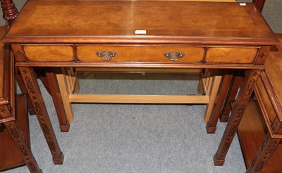Lot 1234 - A crossbanded bur walnut reproduction console table (en suite with previous lot)