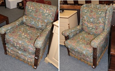 Lot 1243 - A pair of early 20th century carved oak armchairs, later recovered in floral fabric