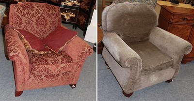 Lot 1245 - A red upholstered armchair together with another armchair (2)