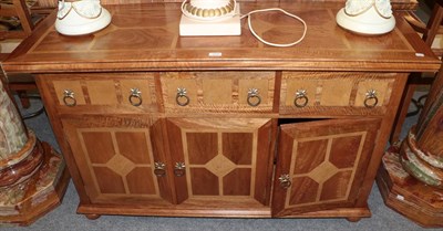 Lot 1255 - A Barker & Stonehouse Flagstone sideboard fitted with three drawers and three cupboards, 140cm...