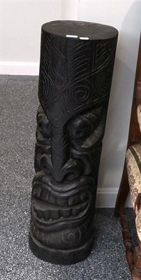 Lot 1287 - ~ A 20th century ebonised carved Maori style totem