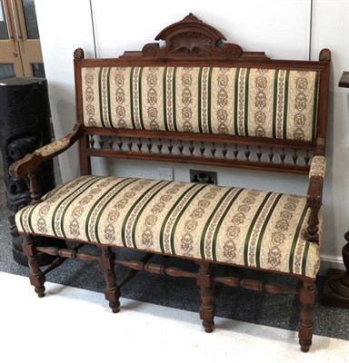 Lot 1288 - ~ A continental walnut part upholstered settle, 130cm long by 132cm high