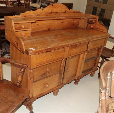 Lot 1295 - A Victorian pine sideboard, 152cm by 55cm by 122cm high