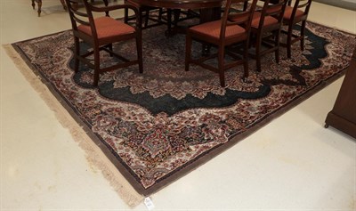 Lot 1299 - A large Iranian carpet, 400cm by 300cm