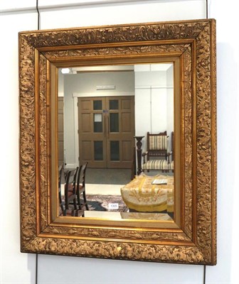 Lot 1305 - ~ A gilt framed mirror