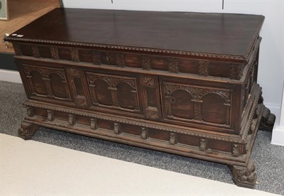 Lot 1306 - ~ A carved wood Continental coffer