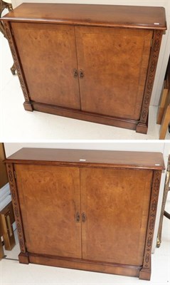 Lot 1321 - A pair of reproduction crossbanded burr walnut low tables, each decorated with blind fretwork,...