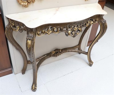 Lot 1324 - A reproduction marble top console table in the French taste, 122cm by 37cm by 88cm high